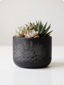 Decorative patterns engraved on a ceramic planter.