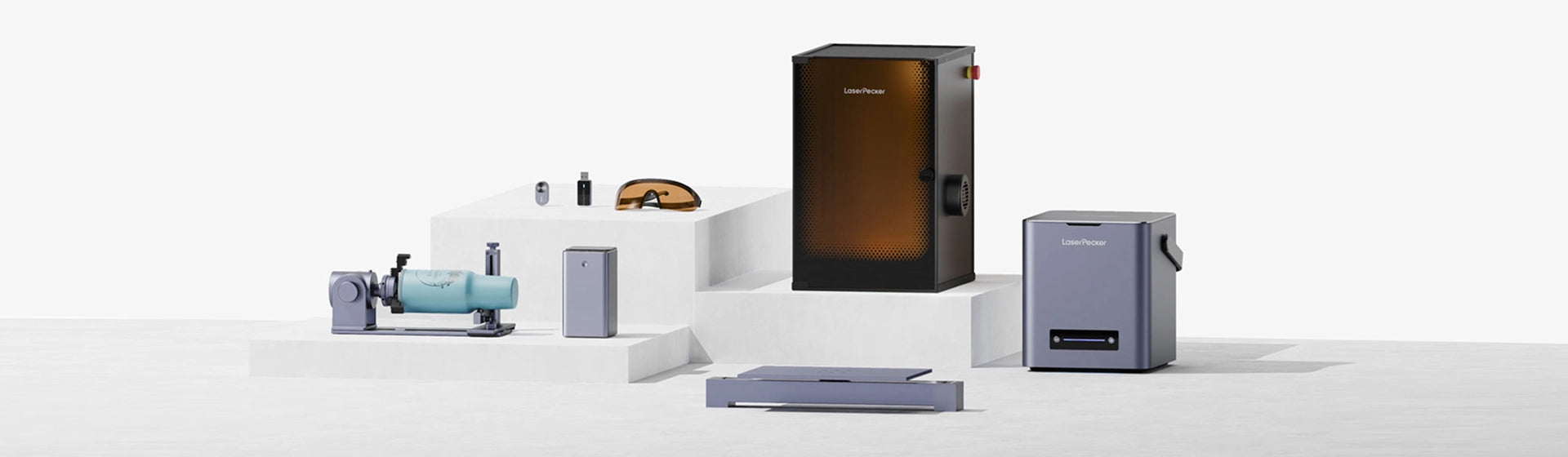 A collection of LaserPecker LP4 accessories for extension, safety, and portability.