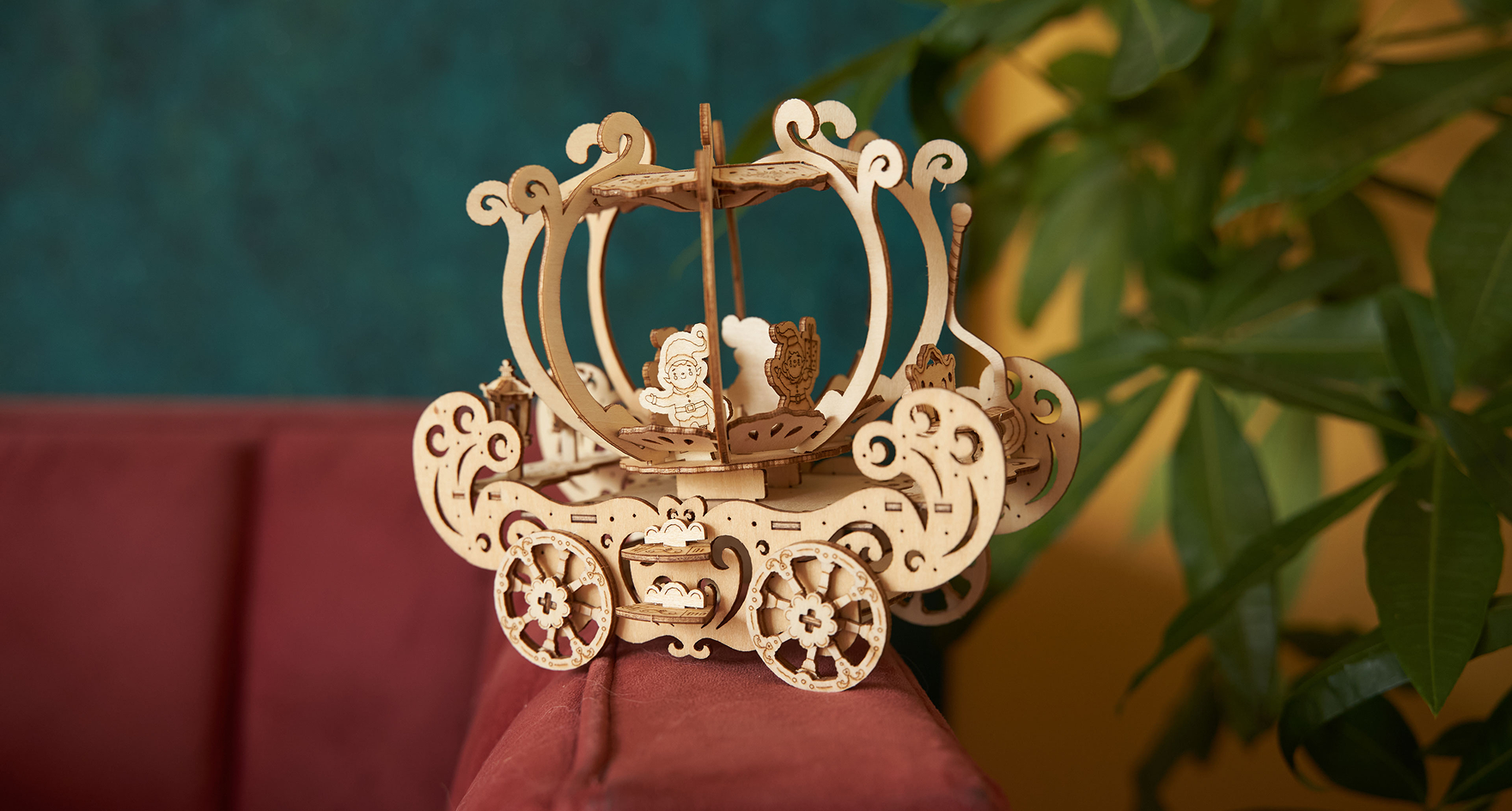 A beautiful 3D pumpkin carriage model assembled from plywood pieces laser cut by LaserPecker LP4.